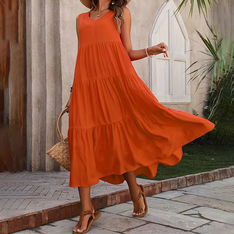 Women's long flowy tiered summer dress, a must-have for vacation outfits.