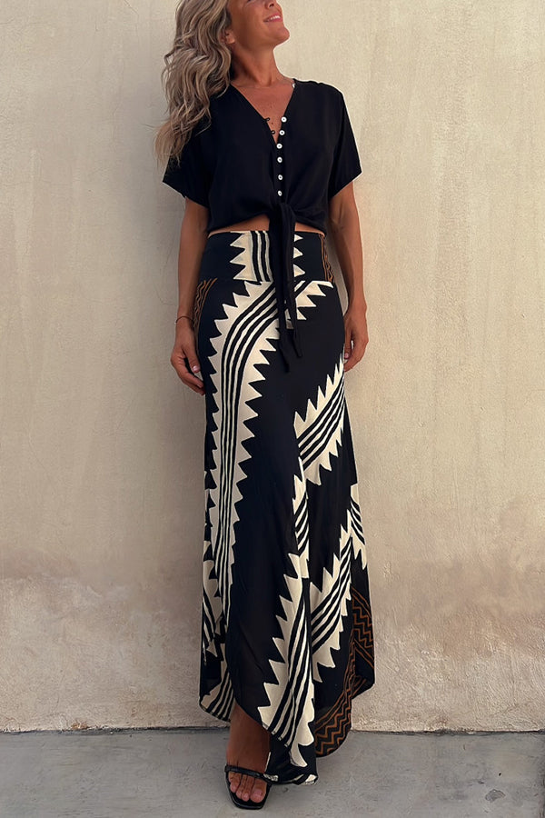Women's flowy tiered pleated maxi skirt with elastic waist, perfect for casual summer or autumn wear.