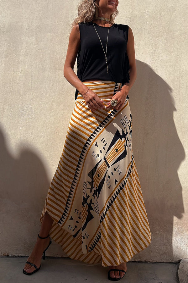 Elegant women's tiered maxi skirt featuring a graceful pleated design and comfortable elastic waist.