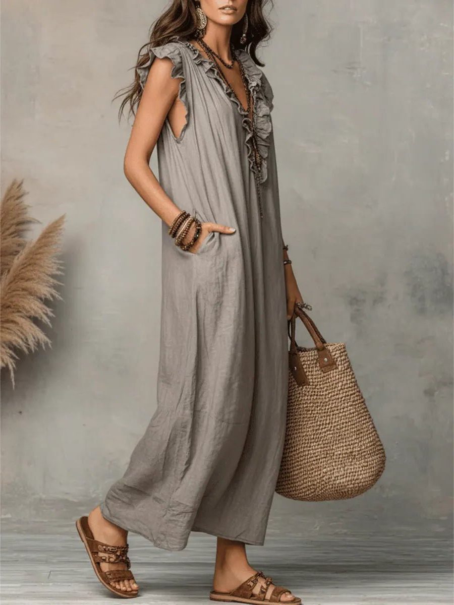 Graceful women's elegant maxi dress, V-neck, flowy silhouette, and delicate flutter sleeves for any event.