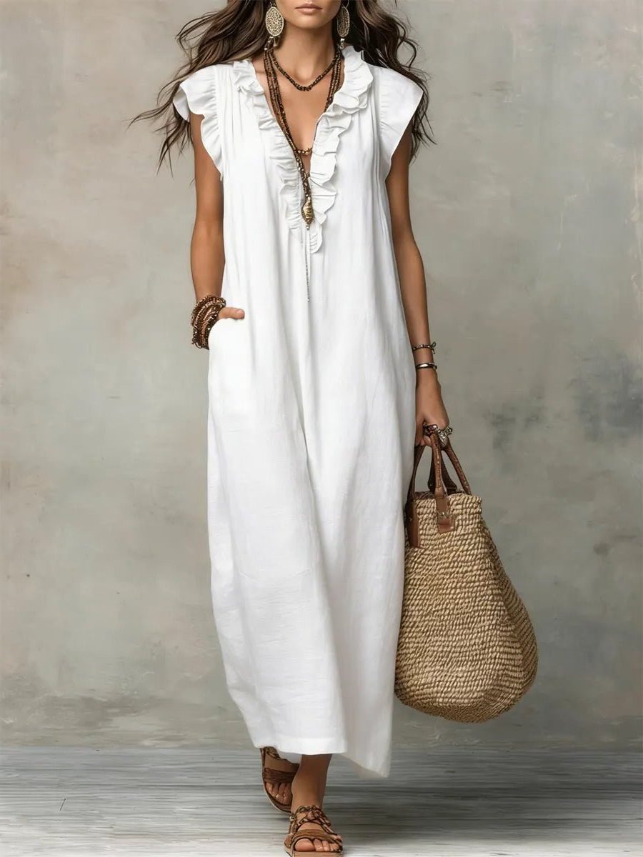 Versatile women's flowy V-neck maxi dress, flutter sleeves, great for summer, beach, or casual outings.