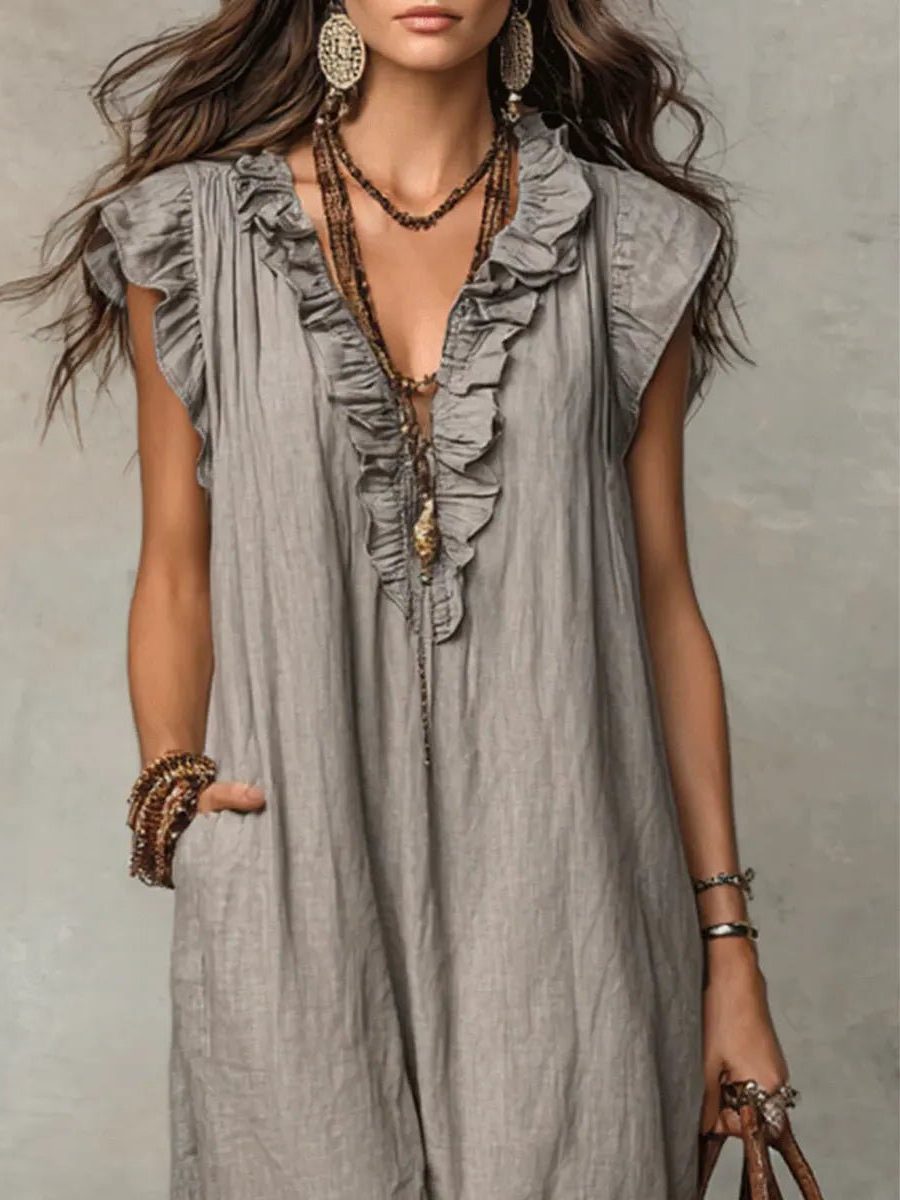 Essential women's vacation maxi dress with a V-neck, flowy design, and charming flutter sleeves.