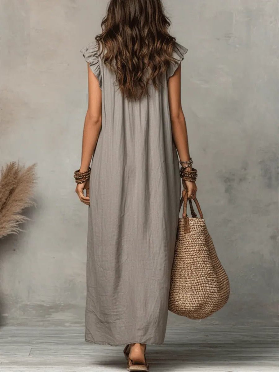 Relaxed fit women's casual maxi dress, V-neck, flowy fabric, and comfortable flutter sleeves for summer.