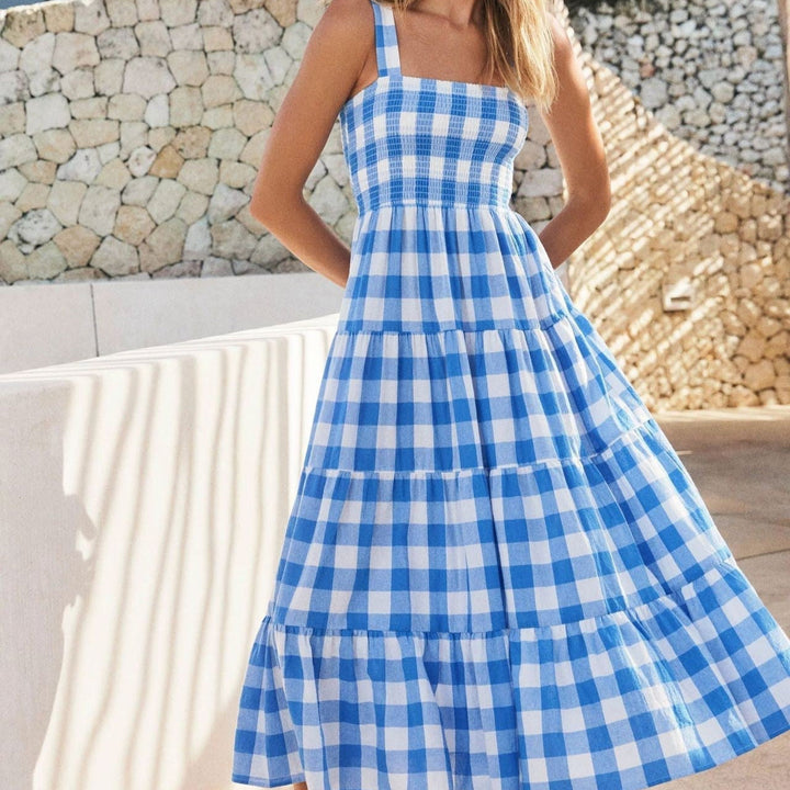 Stylish A-line spaghetti strap summer dress with vintage print, ideal for vacation outfits and beachwear.
