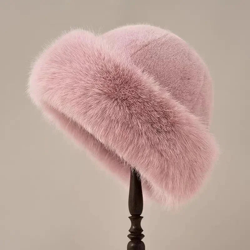 Luxurious women's faux fur winter hat, extra fluffy and warm with a wide brim, ideal for cold weather fashion.
