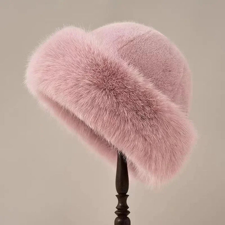 Luxurious women's faux fur winter hat, extra fluffy and warm with a wide brim, ideal for cold weather fashion.