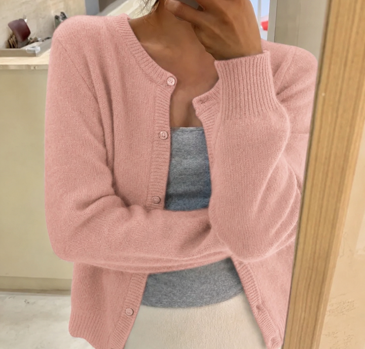 Warm fluffy knit women's cardigan with round neck & button front. Cozy essential for chilly autumn & winter days.