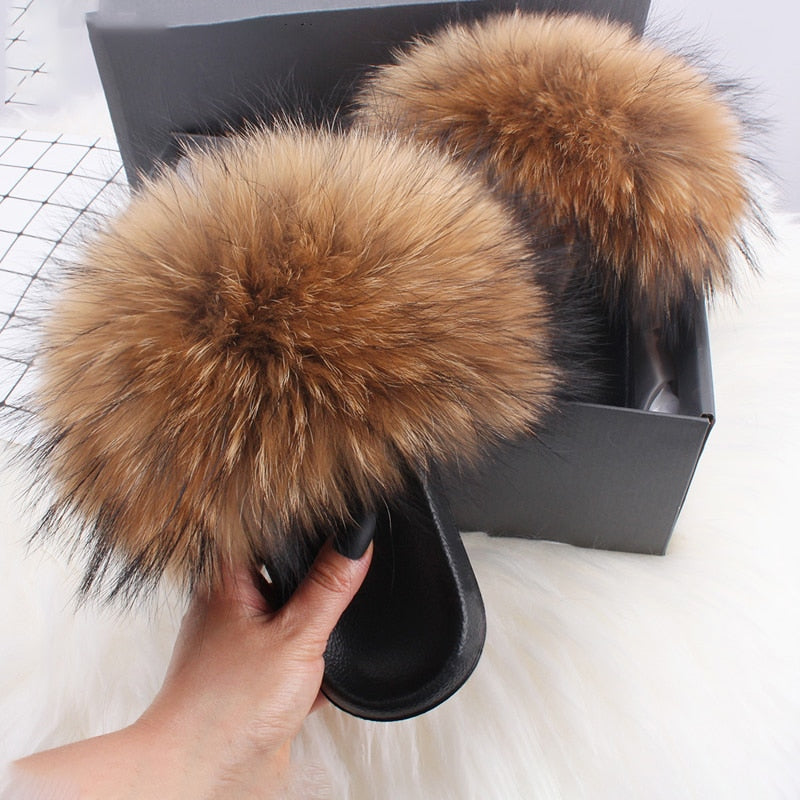 Close-up of women's fluffy open-toe slide slippers, showcasing soft texture & comfort design.