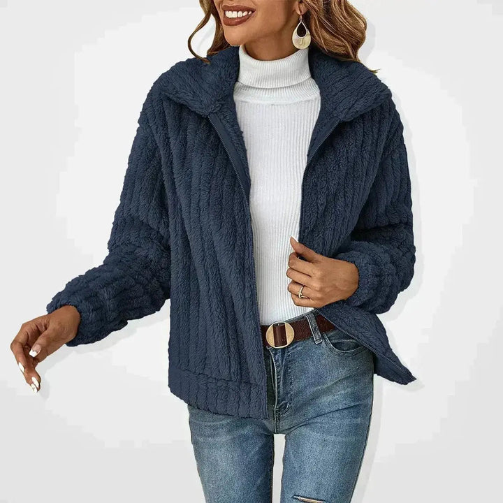 Cozy women's fluffy quilted zip-up jacket for ultimate warmth & comfort during cold autumn & winter days.