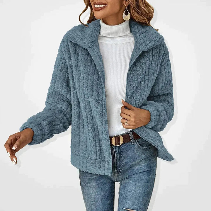 Oversized women's fluffy zip-up quilted jacket, a stylish & warm outerwear piece for casual autumn & winter.