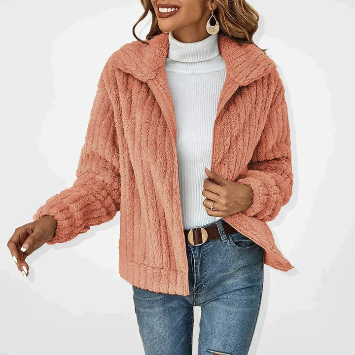 Stylish women's fluffy quilted winter coat; a warm & casual zip-up jacket for everyday autumn fashion.