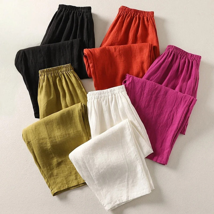 Women's fluid cotton blend wide-leg trousers, offering elegant comfort and a relaxed fit for everyday wear.
