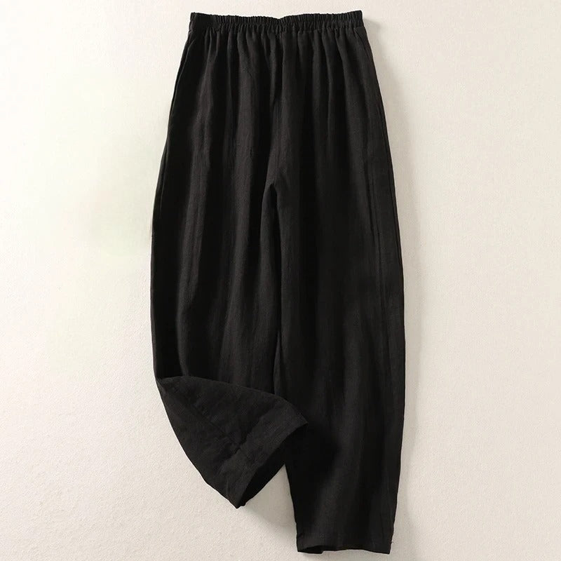 Relaxed fit women's pull-on wide-leg trousers in a fluid cotton blend, designed for ultimate comfort.