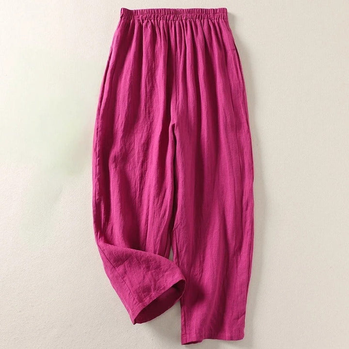 Chic women's wide-leg cotton blend travel pants, featuring a fluid drape for elegant, everyday comfort.