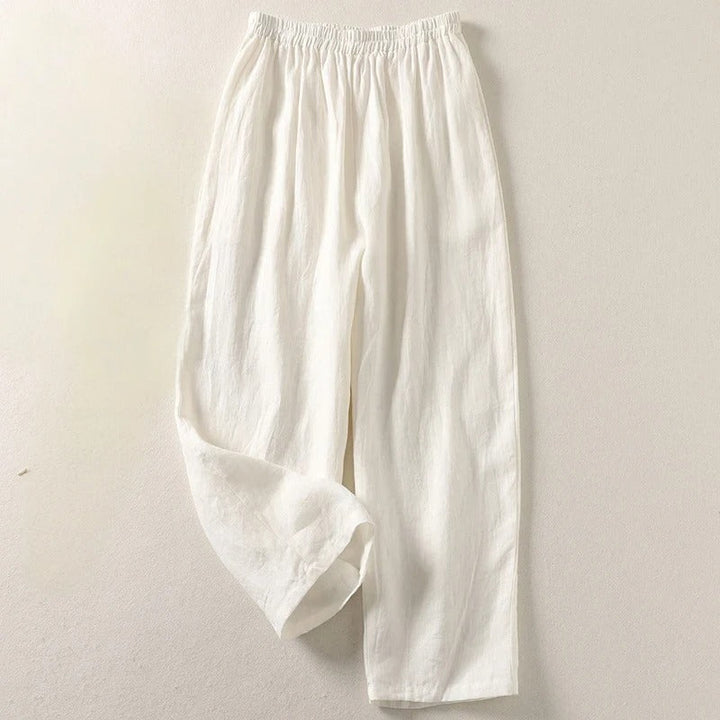 Versatile women's fluid cotton blend wide-leg trousers, styled for casual elegance and warm-weather wear.