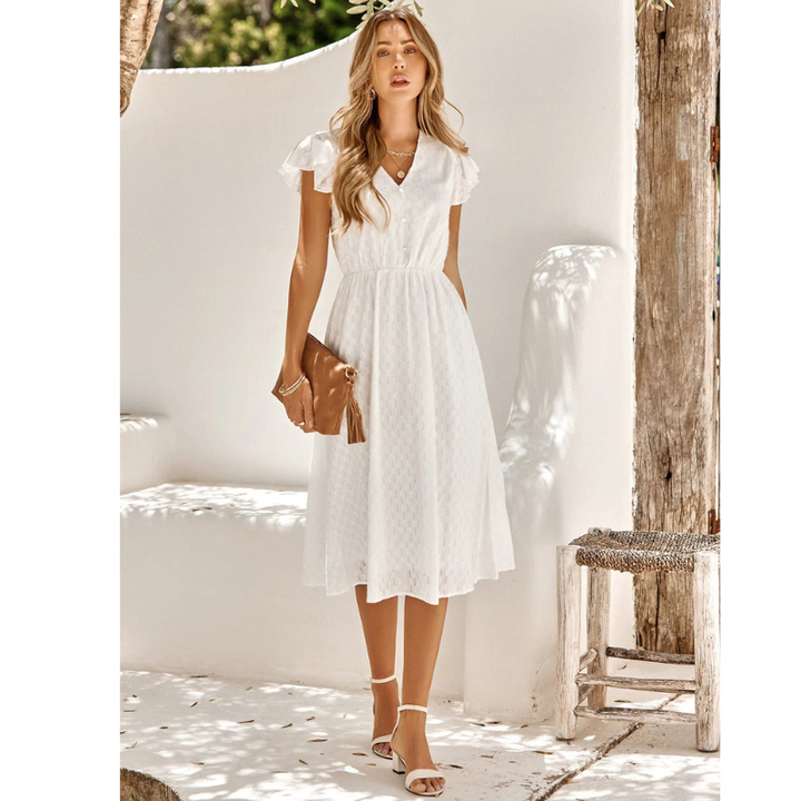 Comfortable relaxed fit women's midi dress featuring graceful flutter sleeves & an A-line skirt. Stylish daywear.