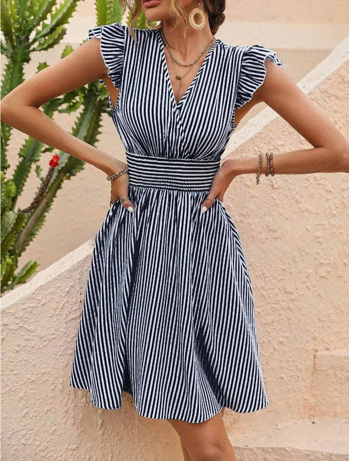 Elegant women's midi sundress, showcasing a striped pattern, airy flutter sleeves & a smocked waist.