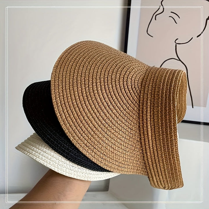 Women's foldable wide brim sun visor hat for UV protection, perfect for beach & travel.