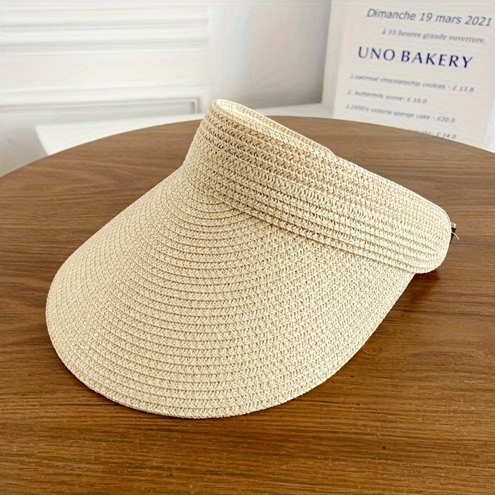 Breathable women's wide brim sun visor, foldable for easy packing. Essential summer beach accessory.