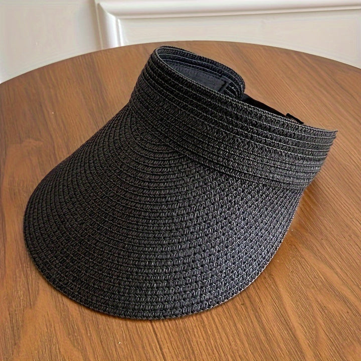 Women's wide brim sun visor, foldable for travel. Protects face from sun at the beach or pool.