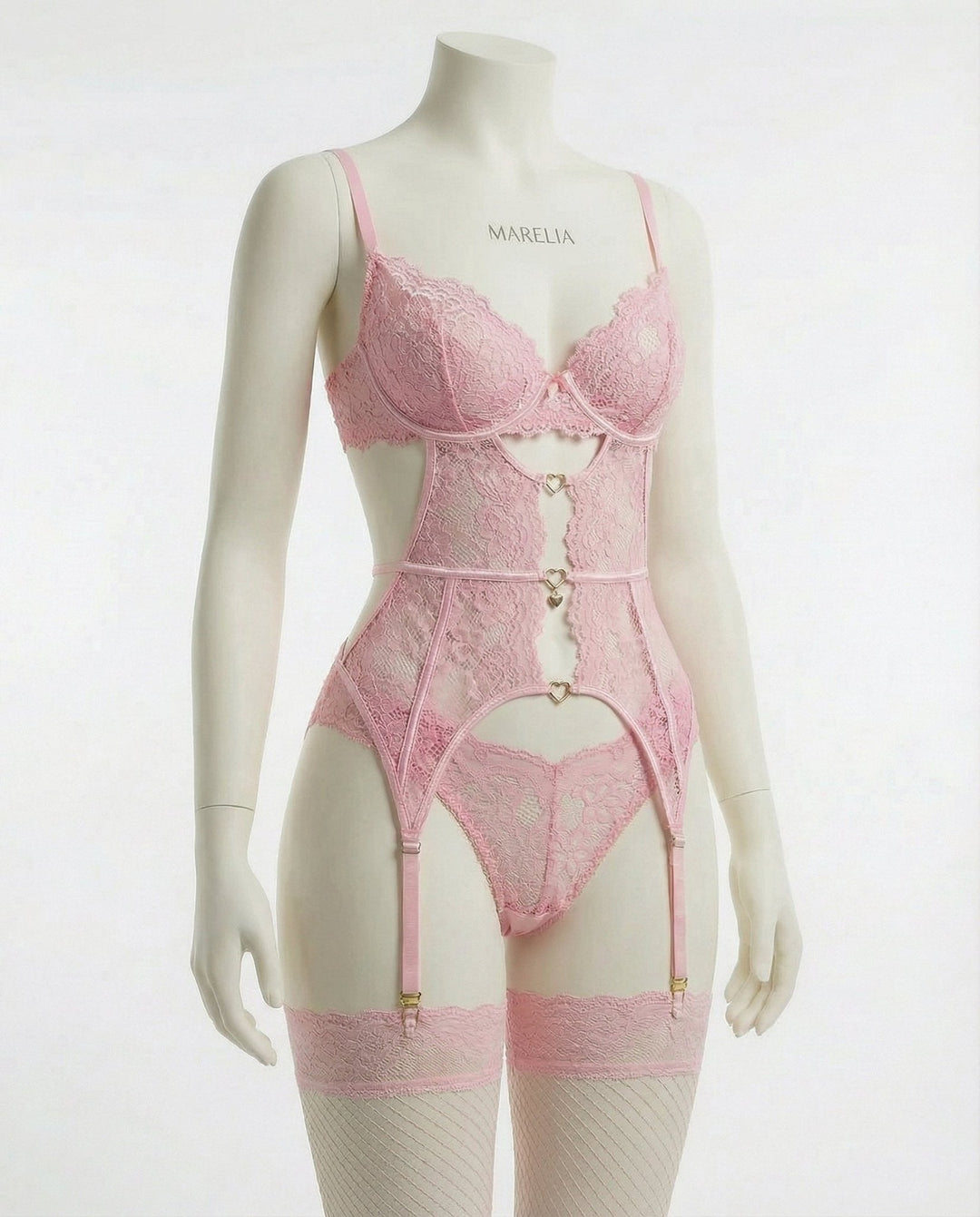 Feminine women's four-piece romantic lingerie set featuring suspender belt and delicate details.