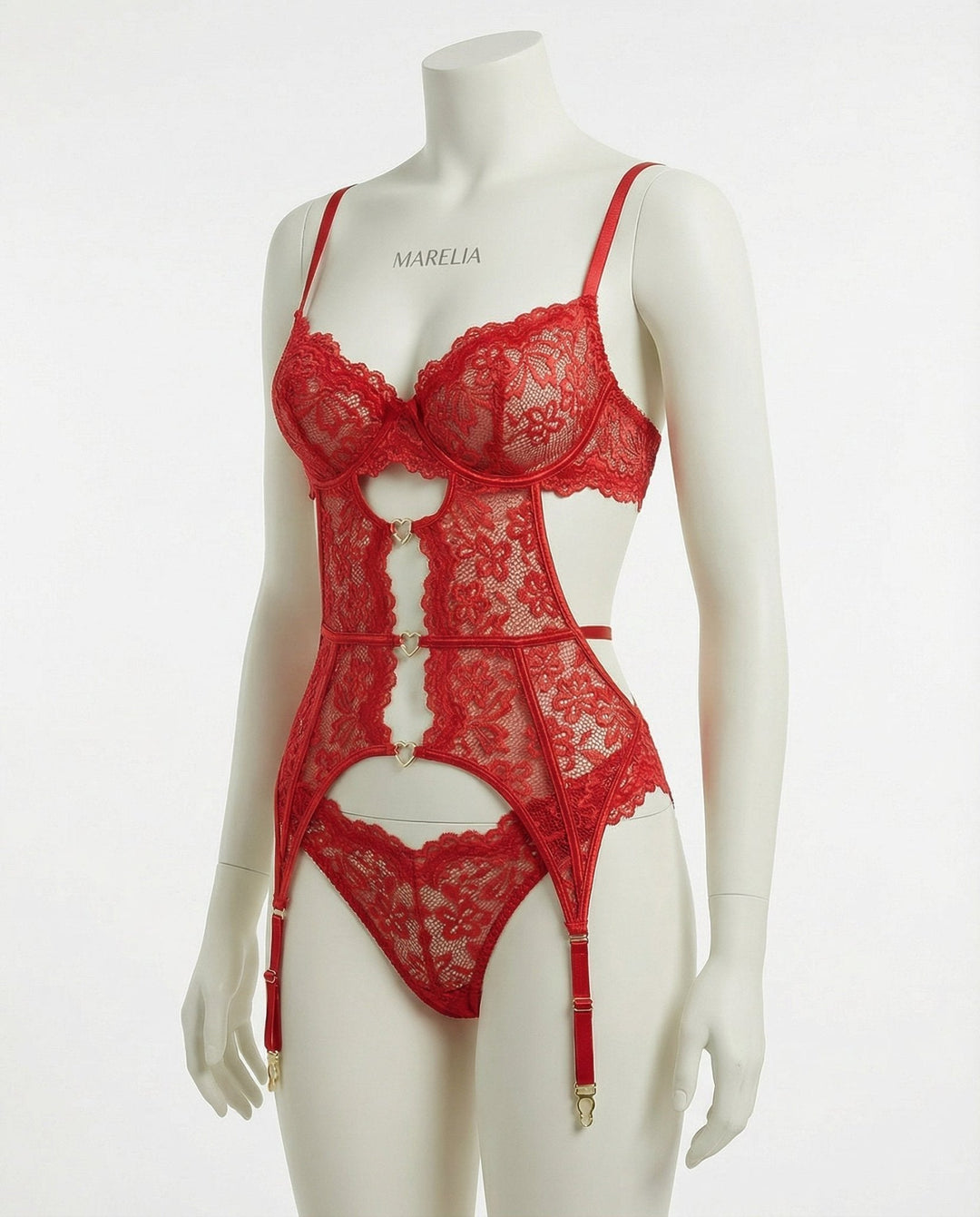Alluring women's four-piece intimate set with suspender belt, underwire bra, and delicate garters.