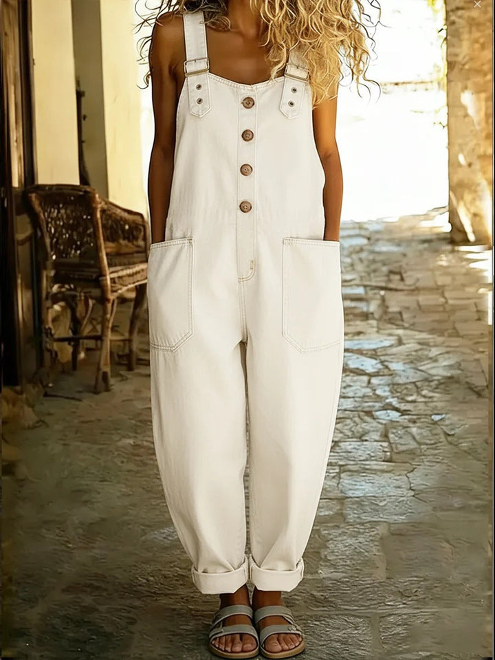 Elegant women's summer jumpsuit with a relaxed fit. Stylish full-length design for chic, casual wear.