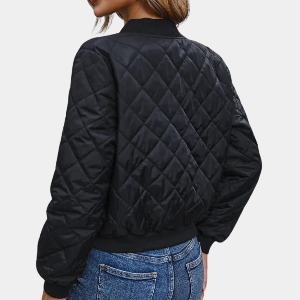 Stylish women's puffer bomber jacket, full-zip design for warmth & urban casual wear. Ideal fall/winter outerwear.