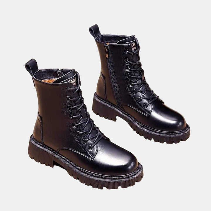 Fashionable women's fur-lined lace-up ankle boots; chic winter footwear for everyday warmth & style.