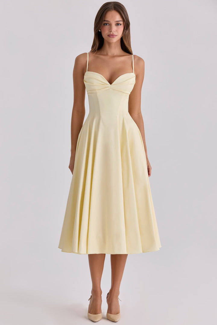Women's gathered bust midi dress in yellow, perfect for summer fashion, casual elegance, and warm weather vacation.