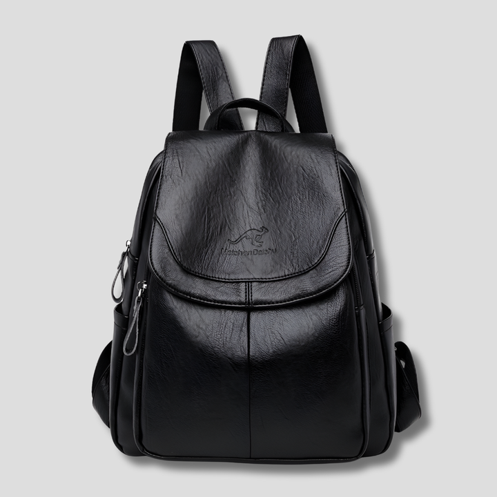 Genuine leather anti-theft backpack for women, featuring elegant embossed detail & secure compartments for daily use.