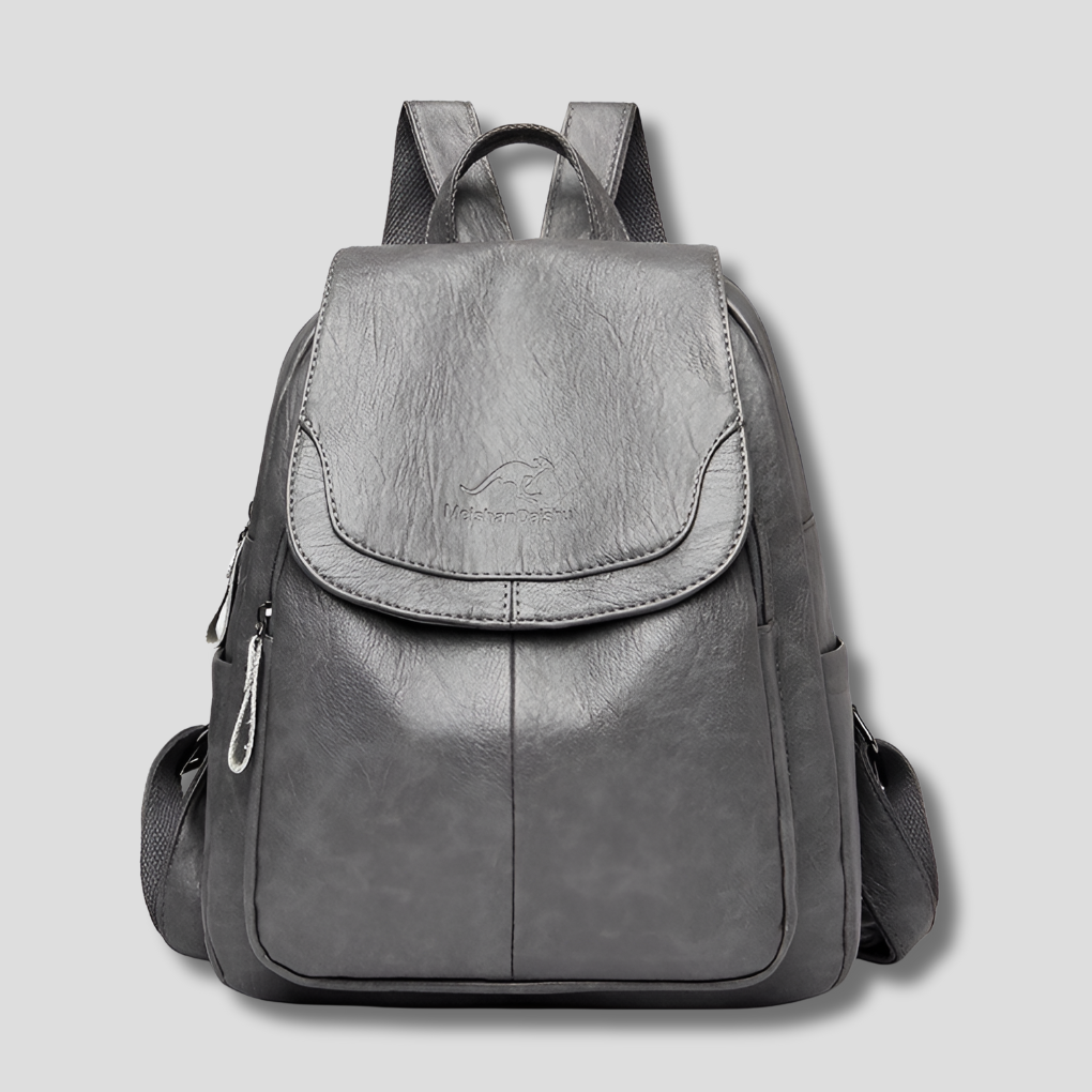Stylish women's embossed leather anti-theft backpack. Secure genuine leather shoulder bag for daily use & travel.