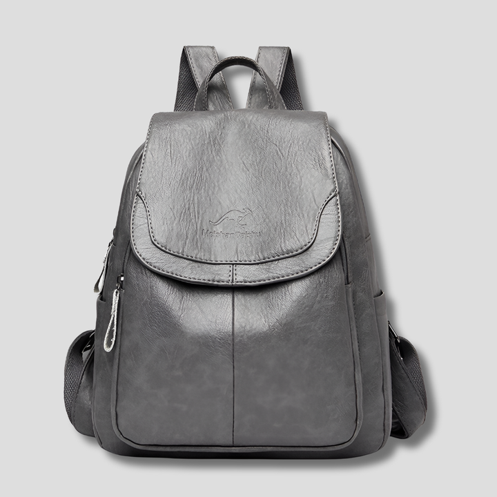 Stylish women's embossed leather anti-theft backpack. Secure genuine leather shoulder bag for daily use & travel.