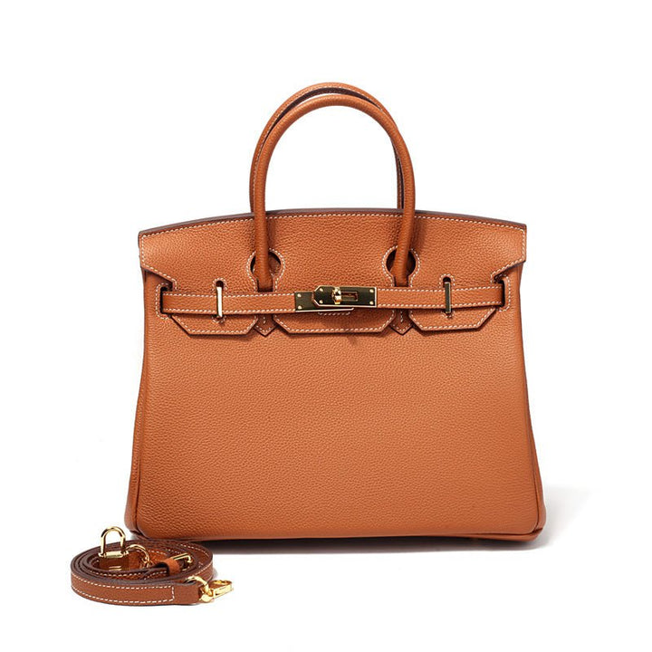 Burgundy genuine leather women's handbag, a sophisticated statement luxury bag.