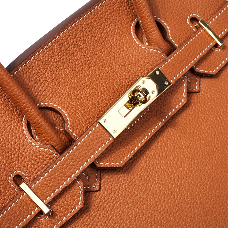 Classic black genuine leather women's handbag, ultimate luxury for everyday elegance.