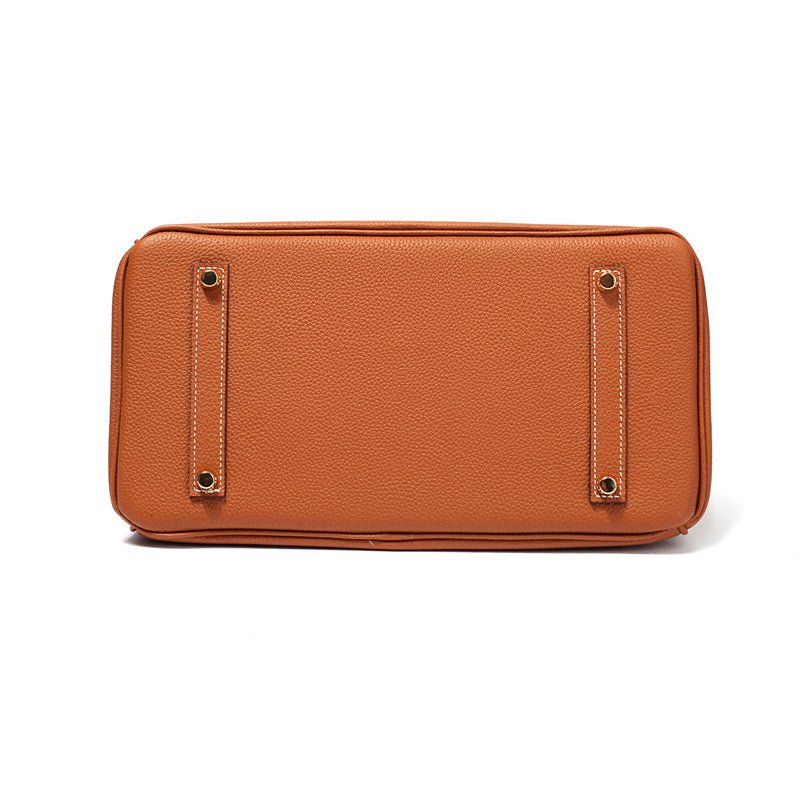 Rich brown genuine leather women's shoulder bag, a durable and stylish everyday carry.