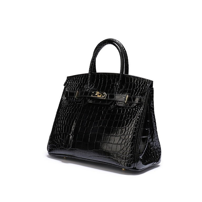 Versatile genuine leather women's handbag, perfect for office or elegant evening wear.