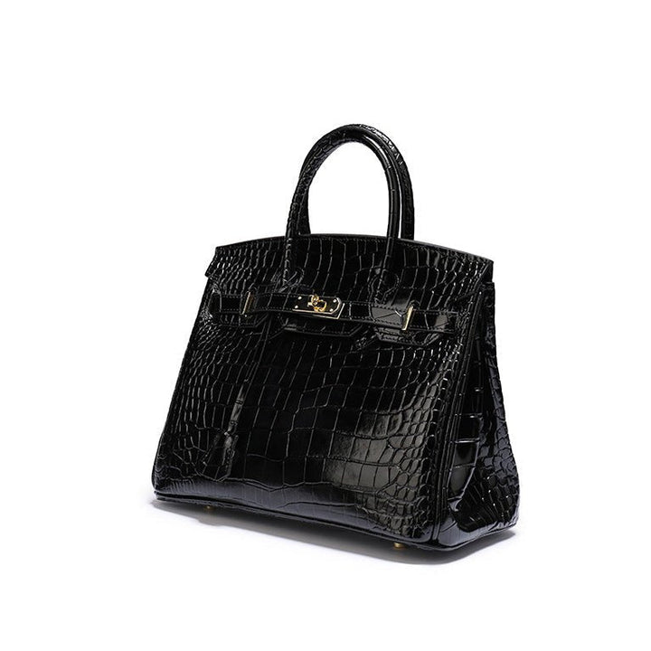 Versatile genuine leather women's handbag, perfect for office or elegant evening wear.