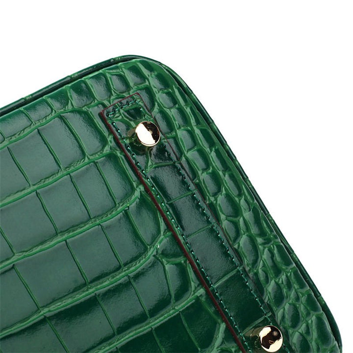 Sleek genuine leather women's shoulder bag, a minimalist luxury fashion accessory.