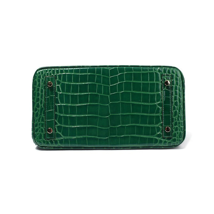 Refined women's genuine leather work bag, offering elegance and ample storage.