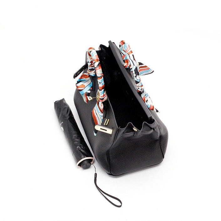 Handcrafted genuine leather women's shoulder bag, elegant and built to last.