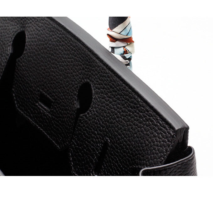 Women's elegant genuine leather purse, a statement of refined taste and practicality.