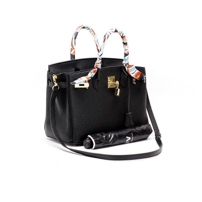 Functional genuine leather women's work bag, spacious for all your essentials.