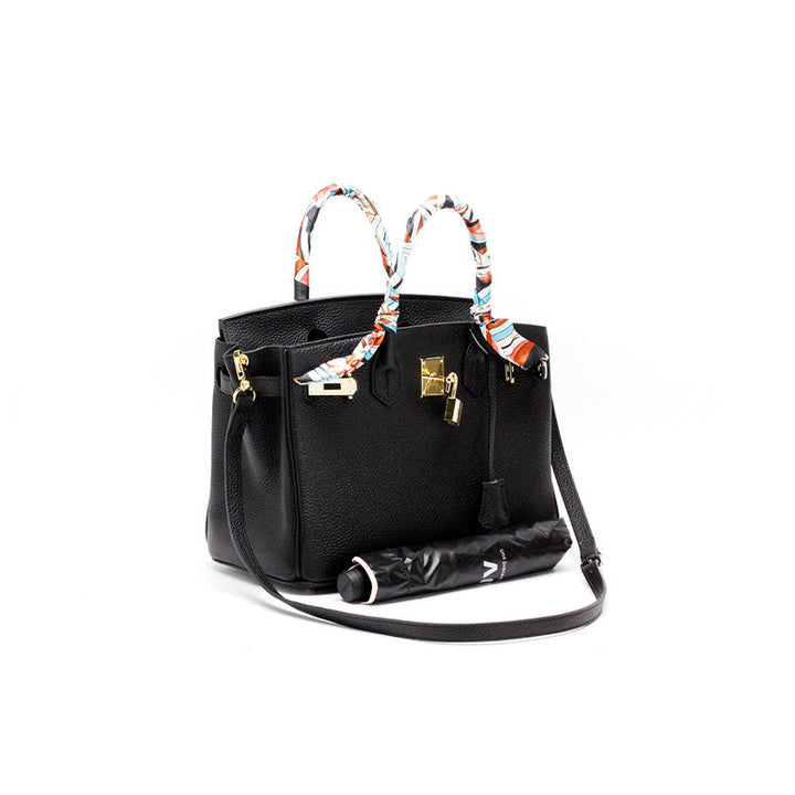 Soft genuine leather women's shoulder bag, supple yet structured for luxury.