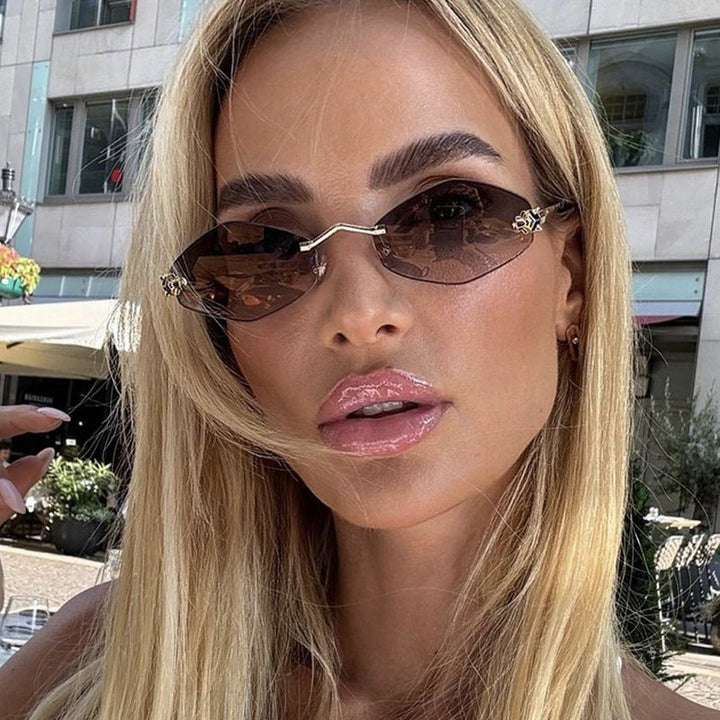 Women's geometric double frame sunglasses with UV protection. Stylish metal eyewear for modern fashion.