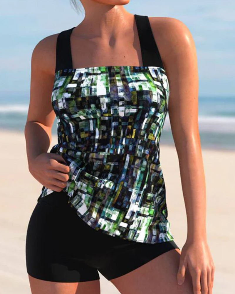 Women's geometric print tankini set with matching shorts for summer beachwear.
