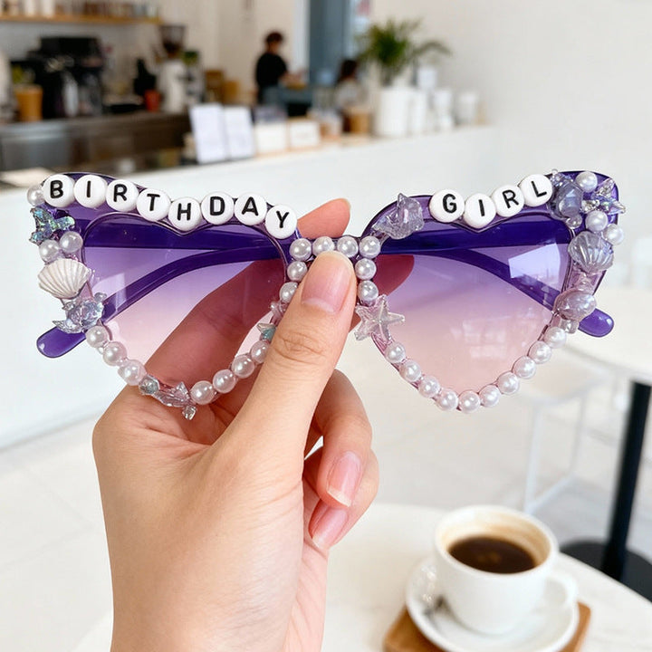 UV protective women's cat-eye sunglasses, glamorous and embellished, a must-have fashion accessory.