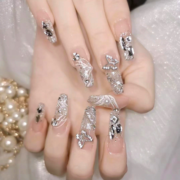 Women's glamorous crystal press-on nails for an instant manicure. Reusable fake nail art with sparkling crystals.