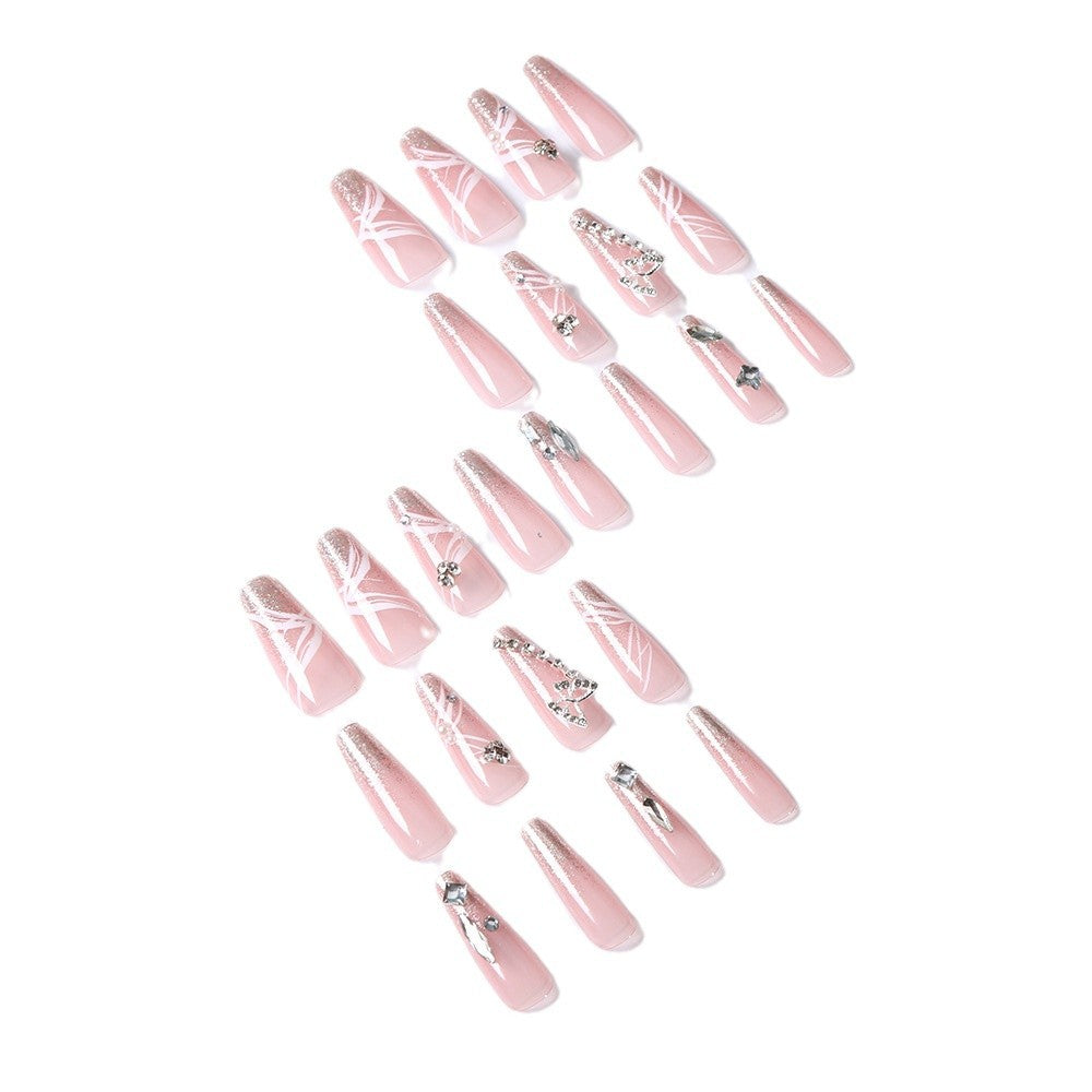 Detailed view of glamorous crystal press-on nails for women. Reusable fake nail art set, perfect for instant style.