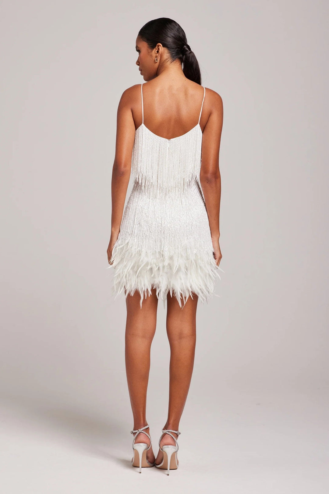 Women's glamorous fringe feather mini party dress, a chic cami slip for special occasions.